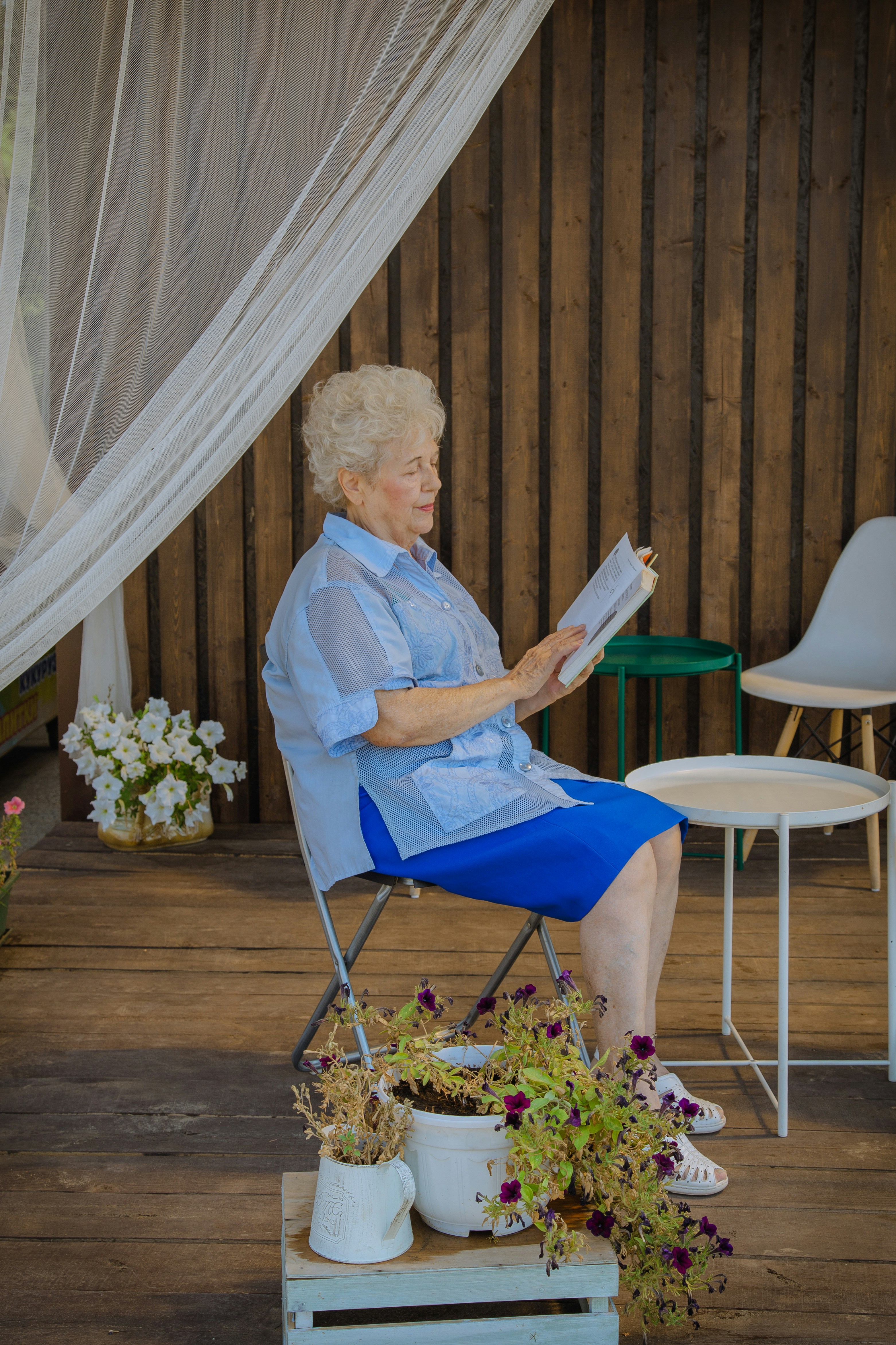 Elderly woman reading peacefully