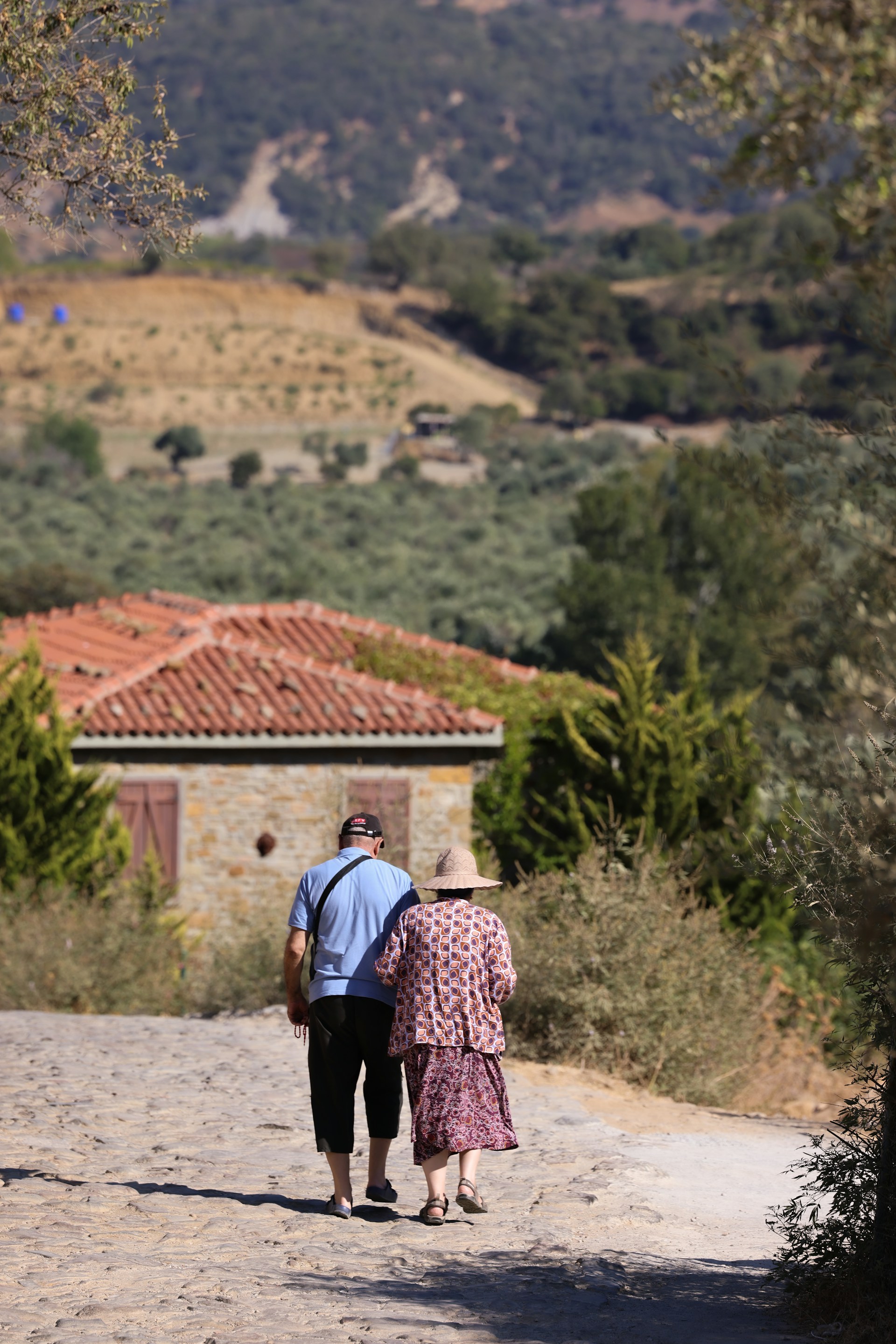 Couple walking on Mediterranean path